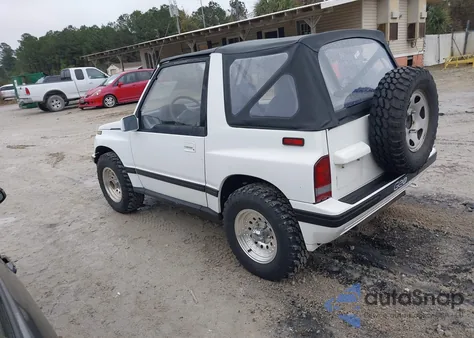 1990 Geo Tracker from USA, damaged, VIN 2CNBJ18U2L6227085
